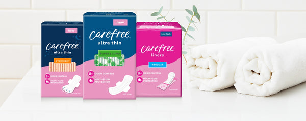 Trio of Carefree products: Carefree Overnight Pads, Carefree Super Long Pads, and Carefree Regular Liners